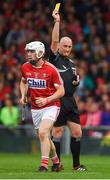 26 August 2018; Eoghan Murphy of Cork is shown the yellow card by referee John Keenan during the Bord Gais Energy GAA Hurling All-Ireland U21 Championship Final match between Cork and Tipperary at the Gaelic Grounds in Limerick. Photo by Piaras Ó Mídheach/Sportsfile