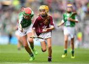 19 August 2018; Caoimhe Kelly, Scoil Bhríde, Ballinasloe, Co Galway, representing Galway, in action against Niamh Toland, St Patrick's Girls, Carndonagh, Donegal, representing Limerick, during the INTO Cumann na mBunscol GAA Respect Exhibition Go Games at the GAA Hurling All-Ireland Senior Championship Final match between Galway and Limerick at Croke Park in Dublin. Photo by Eóin Noonan/Sportsfile