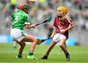 19 August 2018; Caoimhe Kelly, Scoil Bhríde, Ballinasloe, Co Galway, representing Galway, in action against Niamh Toland, St Patrick's Girls, Carndonagh, Donegal, representing Limerick, during the INTO Cumann na mBunscol GAA Respect Exhibition Go Games at the GAA Hurling All-Ireland Senior Championship Final match between Galway and Limerick at Croke Park in Dublin. Photo by Eóin Noonan/Sportsfile