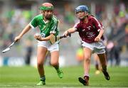 19 August 2018; Niamh Toland, St Patrick's Girls, Carndonagh, Donegal, representing Limerick, in action against Kate Ní Riain, Gaelscoil Eiscir Riada Leamhchán, Co Dublin, representing Galway, during the INTO Cumann na mBunscol GAA Respect Exhibition Go Games at the GAA Hurling All-Ireland Senior Championship Final match between Galway and Limerick at Croke Park in Dublin. Photo by Eóin Noonan/Sportsfile