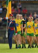 25 August 2018; Donegal captain Karen Guthrie leads her team-mates in the parade before the TG4 All-Ireland Ladies Football Senior Championship Semi-Final match between Cork and Donegal at Dr Hyde Park in Roscommon. Photo by Piaras Ó Mídheach/Sportsfile