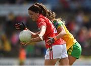25 August 2018; Eimear Scally of Cork in action against Niamh Hegarty of Donegal during the TG4 All-Ireland Ladies Football Senior Championship Semi-Final match between Cork and Donegal at Dr Hyde Park in Roscommon. Photo by Piaras Ó Mídheach/Sportsfile