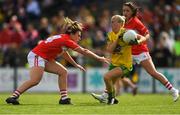 25 August 2018; Treasa Doherty of Donegal in action against Doireann O’Sullivan, left, and Eimear Scally of Cork during the TG4 All-Ireland Ladies Football Senior Championship Semi-Final match between Cork and Donegal at Dr Hyde Park in Roscommon. Photo by Piaras Ó Mídheach/Sportsfile