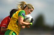 25 August 2018; Yvonne Bonner of Donegal in action against Eimear Meaney of Cork during the TG4 All-Ireland Ladies Football Senior Championship Semi-Final match between Cork and Donegal at Dr Hyde Park in Roscommon. Photo by Piaras Ó Mídheach/Sportsfile