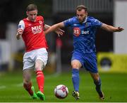 31 August 2018; Ian Bermingham of St Patrick's Athletic in action against Dessie Hutchinson of Waterford during the SSE Airtricity League Premier Division match between St Patrick's Athletic and Waterford at Richmond Park in Dublin. Photo by Harry Murphy/Sportsfile