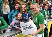 31 August 2018; Diane Caldwell of Republic of Ireland with members of the Stanley family, from left, Fiona, Caitlin and Ciara with baked a cake featuring images of them and the Republic of Ireland players, following the 2019 FIFA Women's World Cup Qualifier match between Republic of Ireland and Northern Ireland at Tallaght Stadium in Dublin. Photo by Stephen McCarthy/Sportsfile