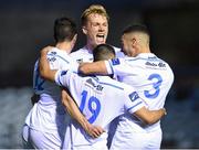 31 August 2018; UCD players, from left, Neil Farrugia, Greg Slogget and Evan Osam congratulate teammate Conor Davis, 19, after he scored his side's first goal during the SSE Airtricity League First Division match between Drogheda United and UCD at United Park in Drogheda, Louth. Photo by Matt Browne/Sportsfile