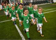 31 August 2018; Players participating in the half time game between Mini Republic of Ireland and Mini Northern Ireland make their way onto the pitch during the 2019 FIFA Women's World Cup Qualifier match between Republic of Ireland and Northern Ireland at Tallaght Stadium in Dublin. Photo by Stephen McCarthy/Sportsfile
