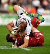 1 September 2018; Will Addison of Ulster is tackled by Steffan Hughes of Scarlets during the Guinness PRO14 Round 1 match between Ulster and Scarlets at the Kingspan Stadium in Belfast. Photo by Oliver McVeigh/Sportsfile