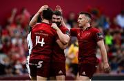 1 September 2018; Darren Sweetnam of Munster, left, is congratulated by team-mates Sam Arnold and Rory Scannell after scoring his side's sixth try during the Guinness PRO14 Round 1 match between Munster and Toyota Cheetahs at Thomond Park in Limerick. Photo by Diarmuid Greene/Sportsfile
