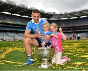 2 September 2018; Eoghan O'Gara of Dublin and daughters Fiadh, age 11 months, and Ella, age 7, celebrate with the Sam Maguire Cup following the GAA Football All-Ireland Senior Championship Final match between Dublin and Tyrone at Croke Park in Dublin. Photo by Seb Daly/Sportsfile