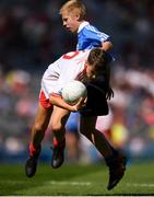2 September 2018; Tomás Kennedy, Scoil Eoin, Balloonagh, Tralee, Co Kerry, representing Tyrone, in action against Brian Mulvey, Colehill NS, Co Longford, representing Dublin, during the INTO Cumann na mBunscol GAA Respect Exhibition Go Games at the Electric Ireland GAA Football All-Ireland Minor Championship Final match between Kerry and Galway at Croke Park in Dublin. Photo by Eóin Noonan/Sportsfile