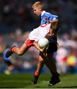 2 September 2018; Tomás Kennedy, Scoil Eoin, Balloonagh, Tralee, Co Kerry, representing Tyrone, in action against Brian Mulvey, Colehill NS, Co Longford, representing Dublin, during the INTO Cumann na mBunscol GAA Respect Exhibition Go Games at the Electric Ireland GAA Football All-Ireland Minor Championship Final match between Kerry and Galway at Croke Park in Dublin. Photo by Eóin Noonan/Sportsfile