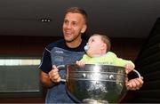 3 September 2018; Lorcan McAuley, age 15 months, from Sixmilebridge, Co Clare, with Dublin footballer Jonny Cooper during the All-Ireland Senior Football Champions visit to Our Lady's Children's Hospital, Crumlin in Dublin. Photo by Piaras Ó Mídheach/Sportsfile