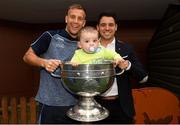 3 September 2018; Dublin footballer Jonny Cooper with Lorcan McAuley, age 15 months, from Sixmilebridge, Co Clare, and his dad Doug during the All-Ireland Senior Football Champions visit to Our Lady's Children's Hospital, Crumlin in Dublin. Photo by Piaras Ó Mídheach/Sportsfile