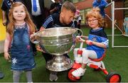 3 September 2018; Dublin footballer Jonny Cooper with Dawn Fahy, age 4, from Cork, and Zoe Lonergan, age 6, from Firhouse, Dublin, during the All-Ireland Senior Football Champions visit to Our Lady's Children's Hospital, Crumlin in Dublin. Photo by Piaras Ó Mídheach/Sportsfile