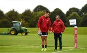 3 September 2018; Conor Murray in conversation with senior strength and conditioning coach PJ Wilson during Munster Rugby squad training at the University of Limerick in Limerick. Photo by Diarmuid Greene/Sportsfile