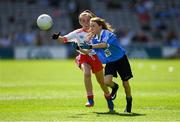 2 September 2018; Aoibhinn Sheridan, Scoil Mhuire Naofa, Carrigallen, Co Leitrim, representing Dublin, in action against Aoibhe Hoey, Jonesboro PS, Newry, Co Down, representing Tyrone, during the INTO Cumann na mBunscol GAA Respect Exhibition Go Games at the Electric Ireland GAA Football All-Ireland Minor Championship Final match between Kerry and Galway at Croke Park in Dublin. Photo by Piaras Ó Mídheach/Sportsfile