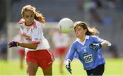 2 September 2018; Aoibhinn Sheridan, Scoil Mhuire Naofa, Carrigallen, Co Leitrim, representing Dublin, in action against Ciara O'Brien, Oven NS, Co Cork, representing Tyrone, during the INTO Cumann na mBunscol GAA Respect Exhibition Go Games at the Electric Ireland GAA Football All-Ireland Minor Championship Final match between Kerry and Galway at Croke Park in Dublin. Photo by Piaras Ó Mídheach/Sportsfile