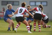 31 August 2018; Michelle Claffey of Leinster, supported by team mate Nicole Purdom, left, in action against Ulster players, from left, Kathryn Dane, Jemma Jackson and Eliza Downey during the Women’s Interprovincial Championship match between Leinster and Ulster at Blackrock RFC in Dublin. Photo by Piaras Ó Mídheach/Sportsfile