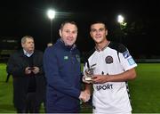 4 September 2018; Ali Reghba of Bohemians is presented with the man of the match award by Tom Mohan, FAI, following the SSE Airtricity League U19 Enda McQuill Cup Final match between St. Patrick's Athletic and Bohemians at Richmond Park in Inchicore, Dublin. Photo by Sam Barnes/Sportsfile