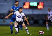 7 September 2018; Ronan Murray of Dundalk in action against Shane Duggan of Limerick during the Irish Daily Mail FAI Cup Quarter-Final match between Limerick and Dundalk at the Markets Field in Limerick. Photo by Eóin Noonan/Sportsfile