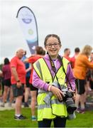 8 September 2018; parkrun Ireland in partnership with Vhi, added their 96th event on Saturday, 8th September, with the introduction of the Mungret parkrun in Co. Limerick. parkruns take place over a 5km course weekly, are free to enter and are open to all ages and abilities, providing a fun and safe environment to enjoy exercise. To register for a parkrun near you visit www.parkrun.ie. Pictured during the Mungret parkrun is volunteer photographer Jane Lynch, aged 11, from Tralee, Co. Kerry, who has attened over 100 parkruns. Photo by Diarmuid Greene/Sportsfile