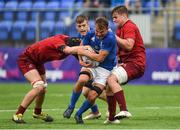 8 September 2018; Jody Booth of Leinster is tackled by Mark Stafford, left, and Alex Kendellen of Munster during the U19 Interprovincial Championship match between Leinster and Munster at Energia Park in Dublin. Photo by Piaras Ó Mídheach/Sportsfile