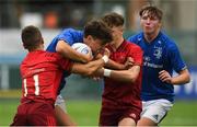 8 September 2018; Max O’Reilly of Leinster, supported by team mate David Fitzgibbon, is tackled by Ronan Quinn, left, and Ben Daly of Munster during the U19 Interprovincial Championship match between Leinster and Munster at Energia Park in Dublin. Photo by Piaras Ó Mídheach/Sportsfile