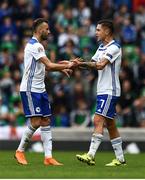 8 September 2018; Elvis Saric of Bosnia and Herzegovina is congratulated by team mate Muhamed Bešic after scoring his side's second goal during the UEFA Nations League B Group 3 match between Northern Ireland and Bosnia & Herzegovina at Windsor Park in Belfast, Northern Ireland. Photo by David Fitzgerald/Sportsfile
