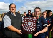 9 September 2018; Ali Brady of Lakewood Athletic is presented the shield by Womens Football Committee member Padraig Hartnett after the FAI Women’s Intermediate Shield Final match between TEK United and Lakewood Athletic at Newhill Park in Two Mile Borris, Tipperary.  Photo by Harry Murphy/Sportsfile