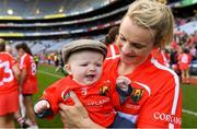 9 September 2018; Briege Corkery of Cork celebrates with her son Tadhg Scannell, age five months, after the Liberty Insurance All-Ireland Senior Camogie Championship Final match between Cork and Kilkenny at Croke Park in Dublin. Photo by Piaras Ó Mídheach/Sportsfile