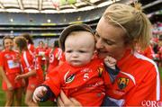 9 September 2018; Briege Corkery of Cork celebrates with her son Tadhg Scannell, age five months, after the Liberty Insurance All-Ireland Senior Camogie Championship Final match between Cork and Kilkenny at Croke Park in Dublin. Photo by Piaras Ó Mídheach/Sportsfile