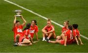 9 September 2018; Cork players, from left, Hannah Looney, Orla Cotter, Chloe Sigerson, Laura Treacy, Libby Coppinger, Orla Cronin and Gemma O'Connor relax with the O'Duffy Cup after the Liberty Insurance All-Ireland Senior Camogie Championship Final match between Cork and Kilkenny at Croke Park in Dublin. Photo by Piaras Ó Mídheach/Sportsfile