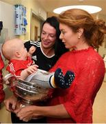 10 September 2018; Cork camogie player Aisling Thompson with Rua Buckley, age 8 months, with his mother Mairead from Aghabullogue, Cork, during the All-Ireland Senior Camogie Champions visit to Our Lady's Children's Hospital in Crumlin, Dublin. Photo by Eóin Noonan/Sportsfile