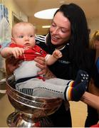10 September 2018; Cork camogie player Aisling Thompson with Rua Buckley, age 8 months from Aghabullogue, Cork, during the All-Ireland Senior Camogie Champions visit to Our Lady's Children's Hospital in Crumlin, Dublin. Photo by Eóin Noonan/Sportsfile