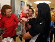 10 September 2018; Cork camogie player Aisling Thompson with Rua Buckley, age 8 months, from Aghabullogue, Cork, during the All-Ireland Senior Camogie Champions visit to Our Lady's Children's Hospital in Crumlin, Dublin. Photo by Eóin Noonan/Sportsfile