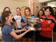 10 September 2018; Sally Fox, age 14, from Shannon, Clare, is presented with the cup by Cork camogie player Aileen Sheehan during the All-Ireland Senior Camogie Champions visit to Our Lady's Children's Hospital in Crumlin, Dublin. Photo by Eóin Noonan/Sportsfile