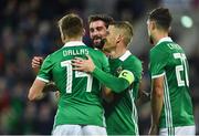 11 September 2018; Stuart Dallas of Northern Ireland celebrates with team-mates Will Grigg, centre, and Steven Davis after scoring his side's second goal during the International Friendly match between Northern Ireland and Israel at the National Football Stadium at Windsor Park in Belfast. Photo by Oliver McVeigh/Sportsfile