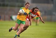 4 August 2018; Eiliish Ward of Donegal  in action against Megan Sheridan of Armagh during the TG4 All-Ireland Ladies Football Senior Championship quarter-final match between Armagh and Donegal at Healy Park in Omagh, Tyrone. Photo by Oliver McVeigh/Sportsfile