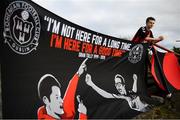14 September 2018; Bohemians supporter Killian Molloy poses for a portrait after hanging a flag in memory of his friend and fellow Bohemians supporter Oran Tully, who passed away recently, prior to the SSE Airtricity League Premier Division match between Bohemians and Cork City at Dalymount Park in Dublin. Photo by Stephen McCarthy/Sportsfile