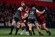14 September 2018; Jean Kleyn of Munster is tackled by Olly Cracknell and Ifan Phillips of Ospreys during the Guinness PRO14 Round 3 match between Munster and Ospreys at Irish Independent Park in Cork. Photo by Brendan Moran/Sportsfile