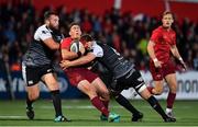 14 September 2018; Ian Keatley of Munster is tackled by Alex Jeffries and Olly Cracknell of Ospreys during the Guinness PRO14 Round 3 match between Munster and Ospreys at Irish Independent Park in Cork. Photo by Brendan Moran/Sportsfile
