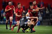 14 September 2018; Dan Goggin of Munster is tackled by Tom Williams of Ospreys during the Guinness PRO14 Round 3 match between Munster and Ospreys at Irish Independent Park in Cork. Photo by Brendan Moran/Sportsfile