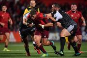 14 September 2018; Ian Keatley of Munster is tackled by Morgan Morris and Alex Jeffries of Ospreys  during the Guinness PRO14 Round 3 match between Munster and Ospreys at Irish Independent Park in Cork. Photo by Brendan Moran/Sportsfile