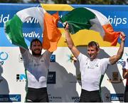 15 September 2018; Paul O'Donovan, left, and Gary O'Donovan of Ireland celebrate on the podium after winning the Lightweight Men's Double Sculls Final on day seven of the World Rowing Championships in Plovdiv, Bulgaria. Photo by Seb Daly/Sportsfile