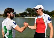 15 September 2018; Paul O'Donovan of Ireland, left, and Tim Brys of Belgium congratulate each other after their crews finished first and third respectively in the Lightweight Men's Double Sculls Final on day seven of the World Rowing Championships in Plovdiv, Bulgaria. Photo by Seb Daly/Sportsfile