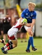 15 September 2018; Matthew Jungmann of Leinster is tackled by Thomas Armstrong of Ulster during the U19 Interprovincial Championship match between Ulster and Leinster at Newforge Country Club in Belfast. Photo by Oliver McVeigh/Sportsfile