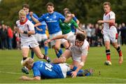 15 September 2018; Matthew Jungmann of Leinster scores his side's first try despite the effort of David McCann of Ulster during the U19 Interprovincial Championship match between Ulster and Leinster at Newforge Country Club in Belfast. Photo by Oliver McVeigh/Sportsfile