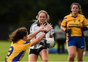 15 September 2018; Aisling McAnespie of Emyvale, Co Monaghan, in action against Niamh O'Dea of Banner Ladies, Ennis, Co Clare, as Eva O'Dea, right, looks on in the Senior Championship Final during the 2018 LGFA All-Ireland Club 7s at Naomh Mearnóg & St Sylvesters in Dublin. Photo by Piaras Ó Mídheach/Sportsfile